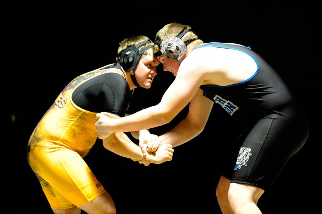 Sequim&rsquo;s McKenzie Stockdale takes on North Mason&rsquo;s Gavin Coffelt at 285 pounds on Jan. 25 in Sequim. Coffelt won the match by pin late in the second round. 
Sequim Gazette photo by Matthew Nash