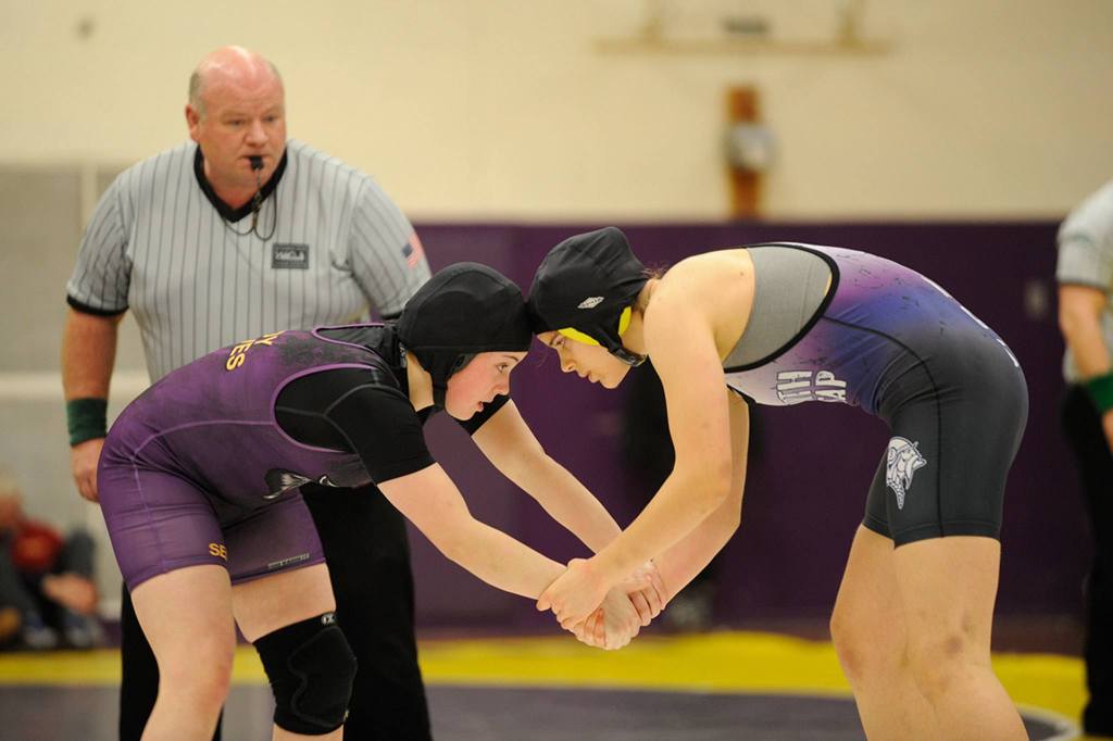 Aylee Bennett&rsquo;s match with Aniika Taylor of North Kitsap at 140 pounds went down to the last second. Taylor had a takedown called back because time expired giving Bennett the 6-4 win. Sequim Gazette photo by Matthew Nash