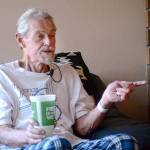 Richard Jones, 69, talks to reporters in his Sequim-area home Monday after being rescued from his car earlier that morning. He was trapped in his car for five days. Jesse Major/Peninsula Daily News