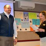 Brian Kuh, the newest Sequim School Board director, is sworn in on Monday, March 20, by Robin Henrikson, board president for the Sequim School Board. He replaces Bev Horan who stepped down on March 7. Sequim Gazette photo by Matthew Nash