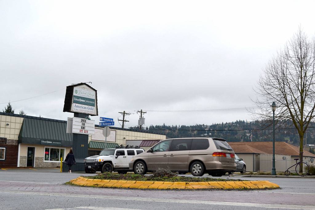 The right-in, right-out traffic island will remain through construction this summer to prevent traffic collisions, say Sequim city staff, because North and South Sunnyside avenues don&rsquo;t directly align. (Matthew Nash/Olympic Peninsula News Group)