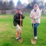 Michael Rief and Ursula Schletter break ground on the first house in Sequim for Olympic Peninsula Special Needs Housing. Photo by Tom Rief