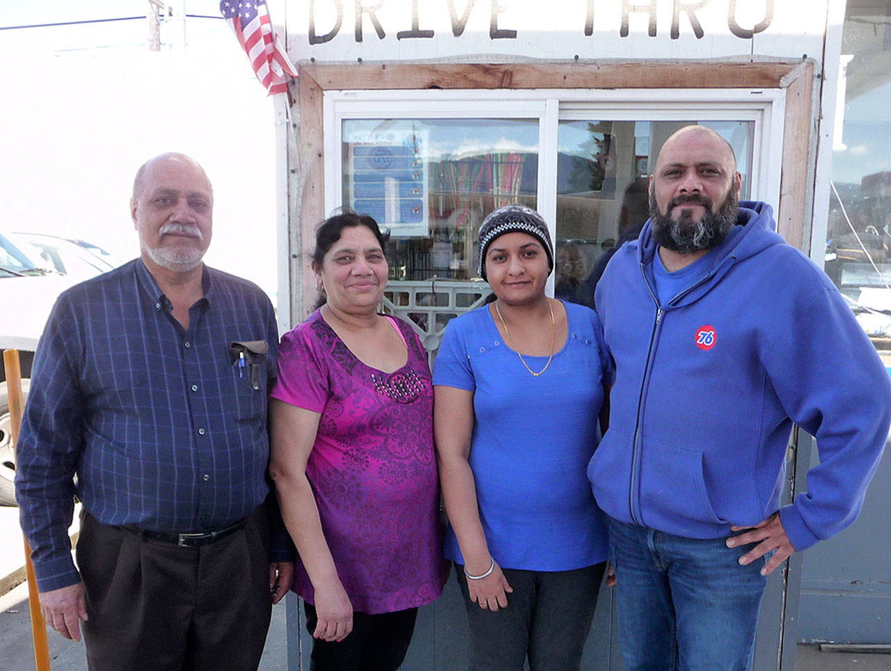 Ready to serve you at Kettel&rsquo;s 76 are members of the Khela family: From left, Singh, Ramesh, Raman and Hap. Sequim Gazette photo by Patricia Morrison Coate