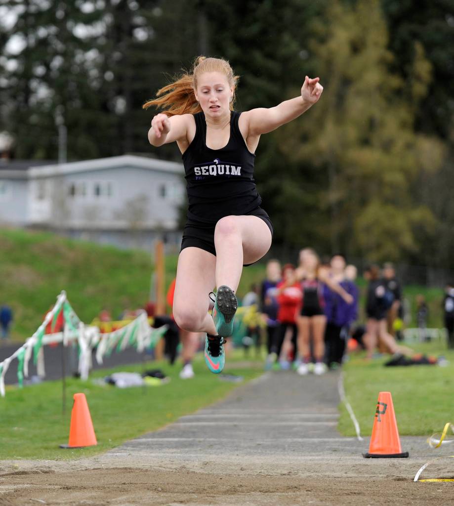 Track & Field: Sequim boys reign in the rain