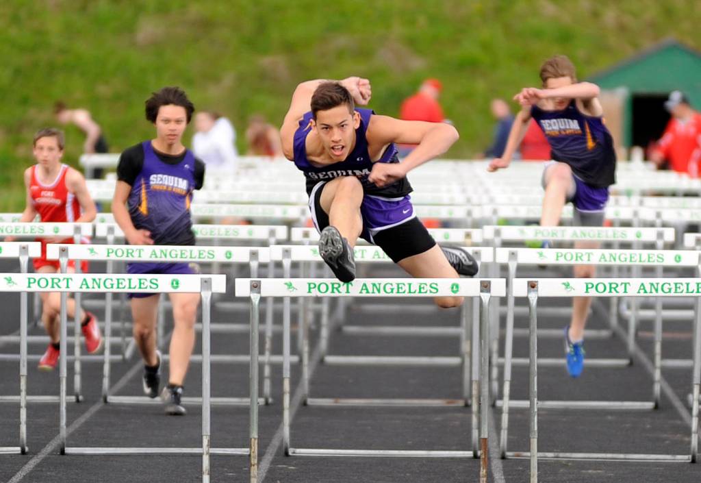 Track & Field: Sequim boys reign in the rain
