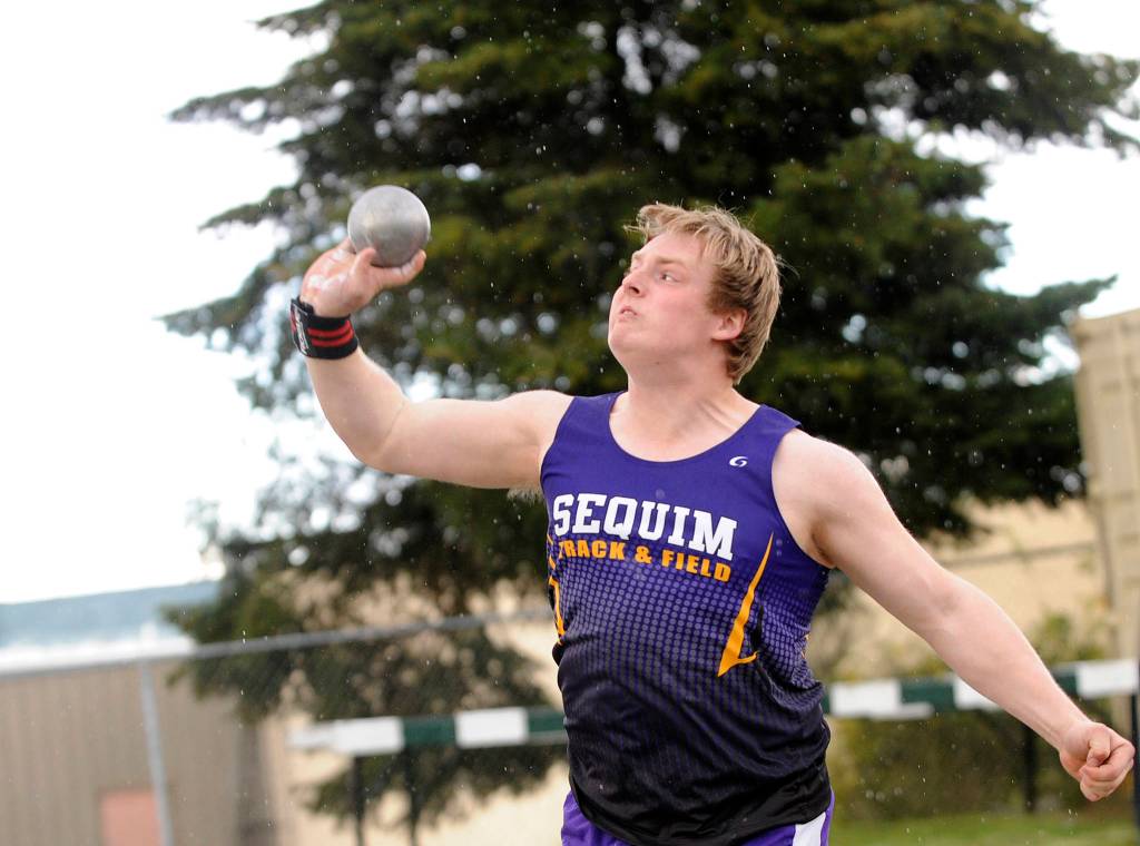 Track & Field: Sequim boys reign in the rain