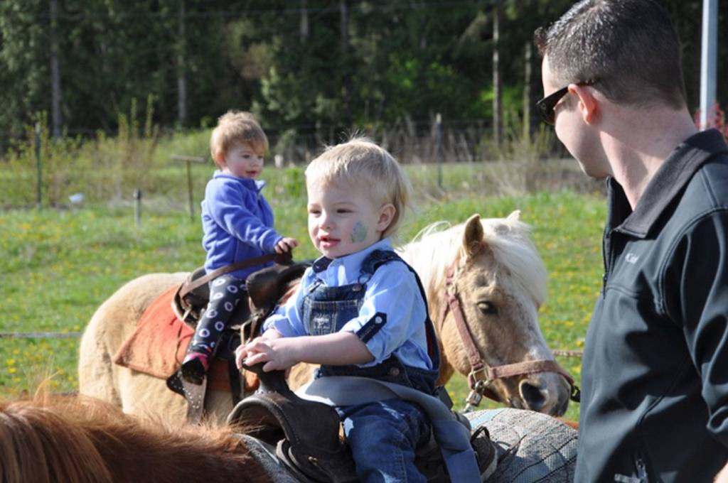 Donny Newman, 2, of Sequim rides a pony at the Sequim Pumpkin Patch on April 15. Photo courtesy of KSQM Radio.