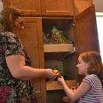 Eating healthy food is an important part of controlling blood sugars for diabetics. For Chloe Loucks, right, she checks with her mom Angela most of the time before eating snacks like peanut butter crackers, applesauce and yogurt which can bring blood sugar levels up.