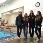 Sequim High School girls swim team members, from left, Sonja Govertsen, Annie Armstrong, Madeline Patterson and Sydney Swanson, continue to help with an effort to install underwater touch pads and a scoreboard in the Sequim YMCA for its many teams. They set a $25,000 goal for mid-August through a GoFundMe online fundraiser and various fundraisers in the months to come. Sequim Gazette photo by Matthew Nash