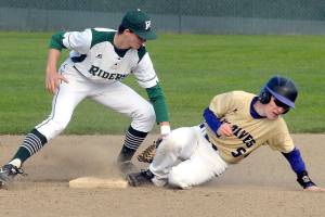 Port Angeles&rsquo; Colton McGuffey, left, cuts off a second base steal attempt by Sequim&rsquo;s Justin Porter in the third inning on April 26 at Volunteer Field in Port Angeles. Photo by Keith Thorpe/Peninsula Daily News