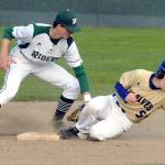 Port Angeles&rsquo; Colton McGuffey, left, cuts off a second base steal attempt by Sequim&rsquo;s Justin Porter in the third inning on April 26 at Volunteer Field in Port Angeles. Photo by Keith Thorpe/Peninsula Daily News