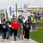 A line of more than 400 marchers make their way through West End Park on the Port Angeles waterfront Saturday to raise awareness of climate change and to promote good stewardship of the environment. Keith Thorpe/Peninsula Daily News