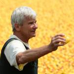 Bob Lovell, co-chair of the 28th annual Great Olympic Peninsula Duck Derby, hands over a winning duck to be recorded Sunday. (Jesse Major/Peninsula Daily News)