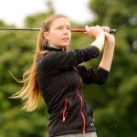 Sequim&rsquo;s Alex McMenamin watches a drive at the 22nd Washington State Women&rsquo;s Amateur Championship at The Cedars at Dungeness in July 2015. Sequim Gazette file photo by Michael Dashiell