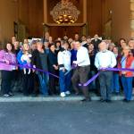 Members of the Sequim-Dungeness Valley Chamber of Commerce and staff for The Cedars at Dungeness celebrate its recent remodel with a ribbon cutting at its entrance on April 26. Sequim Gazette photo by Matthew Nash