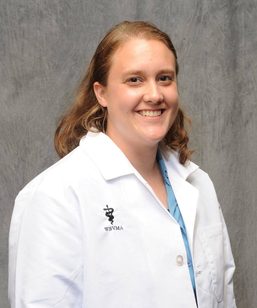 Sequim&rsquo;s Jessica Brooks received a posthumous posthumous degree of Doctor of Veterinary Medicine on May 6 from Washington State University&rsquo;s Veterinary Medicine. Brooks, seen here at her white coat ceremony picture upon entering school in August 2013, died in December of last year in a car wreck. Photo courtesy of the Brooks family