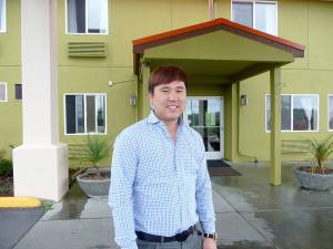 Andy Cho, an Auburn entrepreneur, purchased the former Days Inn & Suites in April and now it&rsquo;s the Red Lion Inn & Suites. Cho plans to renovate the property this fall/winter and says he&rsquo;s excited to be in Sequim. Sequim Gazette photo by Patricia Morrison Coate