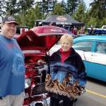 Norma and Mike Garcia Jr. picked the 1955 Chevy to win the Mike Garcia most photogenic award at the Hot Rods & Harleys Show n&rsquo; Cruz on May 13. Garcia Sr. died from pancreatic cancer about a month ago and was a well-loved member of the car community. Participants in the show traveled the Grand Parade route and parked at Sequim Walmart. Photo courtesy of Randy Perry
