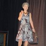 Mary Nesbitt models a dress and accessories during the Sequim Dungeness Hospital Guild&rsquo;s annual luncheon and fashion show.