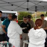 Representatives with the Clallam County Sheriff&rsquo;s Office and Coroner&rsquo;s Office investigate a homicide on the 100 block of Hurricane Drive in Sunland on Thursday, May 4. Sequim Gazette photo by Matthew Nash