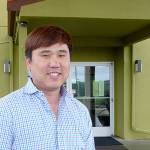 Andy Cho, an Auburn entrepreneur, purchased the former Days Inn & Suites in April and now it&rsquo;s the Red Lion Inn & Suites. Cho plans to renovate the property this fall/winter and says he&rsquo;s excited to be in Sequim. Sequim Gazette photo by Patricia Morrison Coate