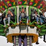 Friends, from left, Emma Swagerty, 12, Natalie Robinson, 10, and Trinity Jones, 11, from Sequim enjoy the last drop on the Drop Zone ride on Saturday night at the Sequim Irrigation Festival&rsquo;s carnival while celebrating Swagerty&rsquo;s birthday. Sequim Gazette photo by Matthew Nash