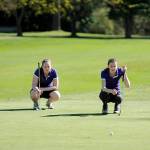 Alex McMenamin, right, and Sarah Shea consider a putt in an Olympic League match in 2016. Sequim Gazette file photo by Michael Dashiell