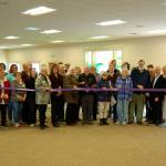 Sequim Mayor Dennis Smith and representatives with the City of Sequim and Sequim-Dungeness Valley Chamber of Commerce cut the ribbon on the remodel of the Guy Cole Convention Center in Carrie Blake Community Park on May 16. Sequim Gazette photos by Matthew Nash