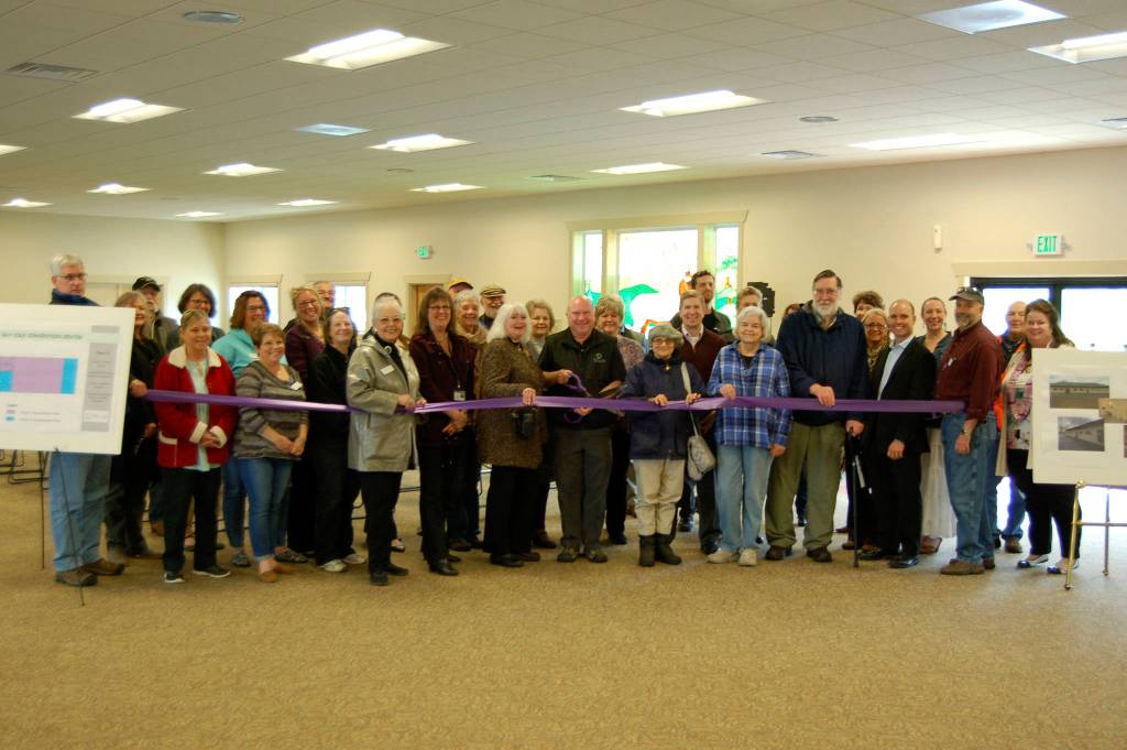 Sequim Mayor Dennis Smith and representatives with the City of Sequim and Sequim-Dungeness Valley Chamber of Commerce cut the ribbon on the remodel of the Guy Cole Convention Center in Carrie Blake Community Park on May 16. Sequim Gazette photos by Matthew Nash
