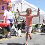 Sophia Heistand of Discovery Bay finishes off 100 turns of the jump rope at last year&rsquo;s Family Fun Day as Kerry Wyamn-Webb looks on. The Fun Day returns on Saturday, May 6, starting with the Kids Parade at 9 a.m. Sequim Gazette file photo by Michael Dashiell