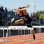 Sequim&rsquo;s Riley Martin looks to keep pace in a 110-hurdles preliminary heat on May 25. Martin took 13th in the event and 12th in the 300 hurdles a day later.