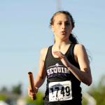 Sequim&rsquo;s Kristinna Barnet and the Wolves vie for a finals-qualifying time in the 4x400 relay at the state 2A track meet on May 25.