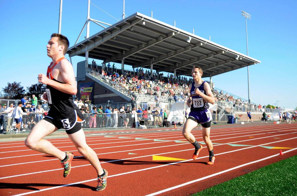 Sequim&rsquo;s Murray Bingham, right, speeds around the track at Mount Tahoma High School as he races to an 11th-place finish at the 2A state meet track and field championships in Tacoma on May 25. Sequim Gazette photo by Michael Dashiell