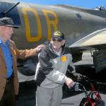 Veterans Frank Meek of the U.S. Navy and Don Alward of the U.S. Marine Corps show delight at the end of their flight aboard a restored B-17 bomber on Wednesday at William R. Fairchild International Airport in Port Angeles. Keith Thorpe/Peninsula Daily News