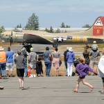 A World War II-era B-17 bomber takes off as a crowd watches at William R. Fairchild International Airport in Port Angeles on June 21 during a stop on the Wings of Freedom Tour of vintage war planes. Keith Thorpe/Peninsula Daily News