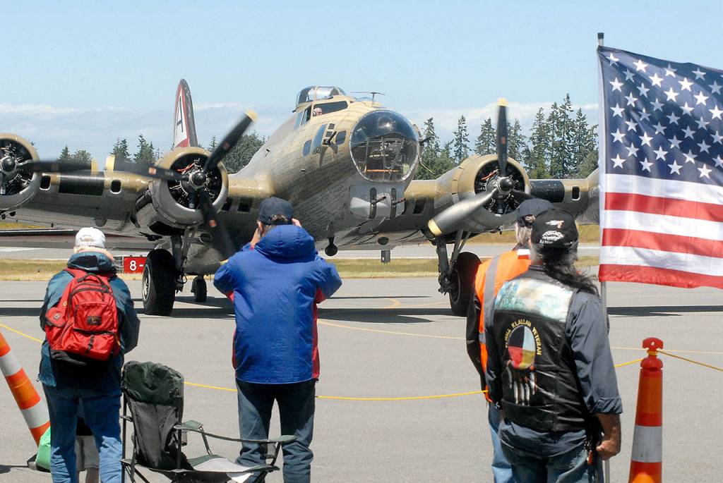 The Wings of Freedom&rsquo;s B-17 bomber taxis into the tarmac after taking a group of World War II veterans on a complimentary ride. Keith Thorpe/Peninsula Daily News