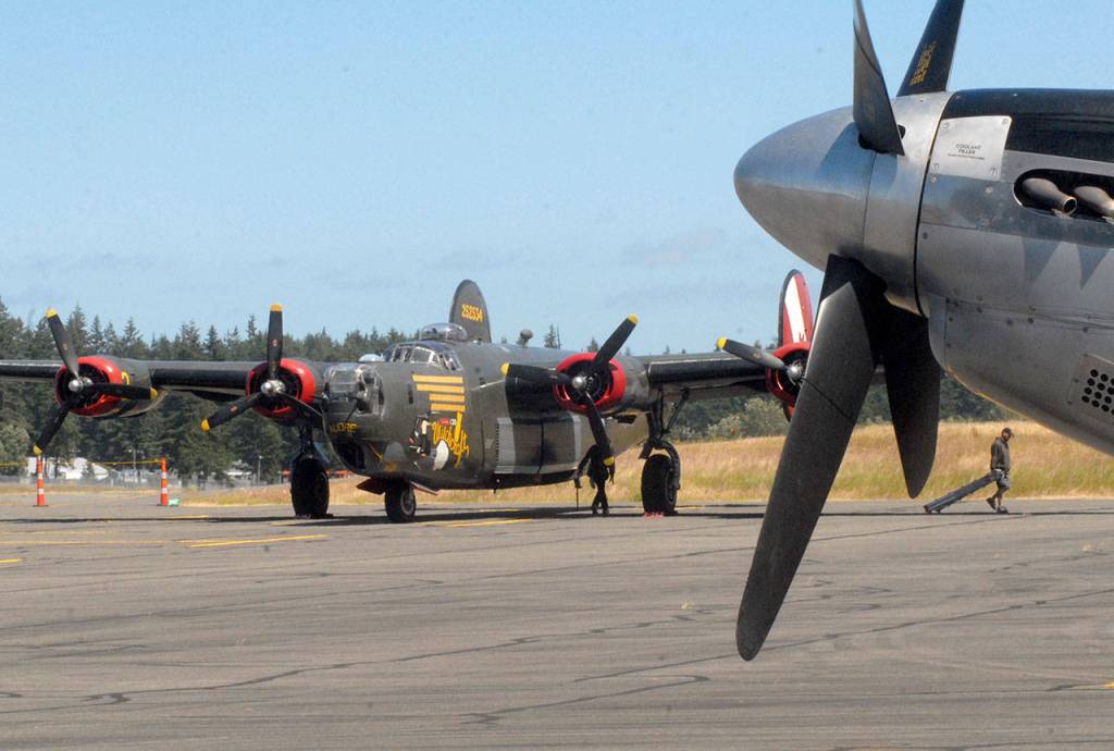 A B-24J Liberator bomber on the Wings of Freedom Tour is readied for visitors after its arrival in Port Angeles on June 21. Keith Thorpe/Peninsula Daily News