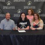 Sequim&rsquo;s Erin Vig (center) in May signs a letter of intent to play at Peninsula College this fall. Joining her are, from left, Peninsula Soccer Academy coach Keith McMinn, all-Olympic League goalkeeper Claire Henninger, PC Pirate (and SHS graduate) Heidi Vereide and Sequim High head coach Derek VanderVelde. Photo courtesy of Peninsula College