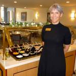 AJ Hitchcock, community relations director at The Fifth Avenue, invites the public to try what she terms &ldquo;the best salad bar in Sequim.&rdquo; Sequim Gazette photo by Patricia Morrison Coate