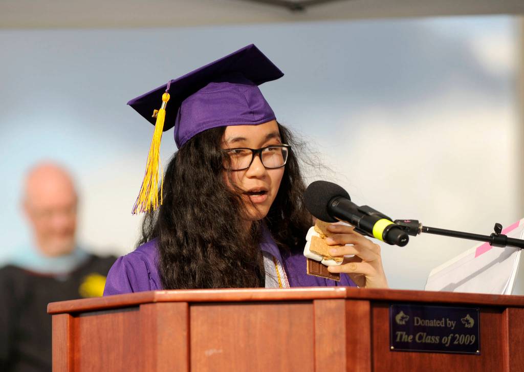 Sequim High co-valedictorian Cathy Dao lauds her adoptive country &mdash; and the treat s&rsquo;mores &mdash; during her speech at Friday night&rsquo;s commencement ceremony. Dao, who moved to Sequim from Vietnam two years ago, joined Morgan Bingham, Grant Pierson and Anika Van Dyken as valedictorians (all boasting 4.0 grade-point-averages) among SHS&rsquo;s 238 graduating seniors.