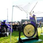 SHS senior Danica Miller prepares to strike a gong as she and fellow graduates receive their diplomas Friday night.