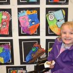 Claire Hardy, kindergartener in Stephanie Grotzke-Nash&rsquo;s class, poses with her piece of art following Pablo Picasso&rsquo;s style. Sequim Gazette photo by Matthew Nash