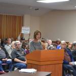 Debra Stevens, a resident on Atterberry Road and retired city planner, speaks during a public comment session on June 1, in the Clallam County Courthouse about a proposed 73-unit manufactured housing development at the intersection of Atterberry and Hooker roads. She said Matriotti Creek should see a buffer of 150 feet due to its classification in Clallam County&rsquo;s Critical Areas Map and a full environmental review should be done on the site. Sequim Gazette photo by Matthew Nash