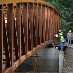 In January, crews work to place the Sequim Bay Bridge in Sequim Bay State Park. The bridge was completed in May and opened to connect the Olympic Discovery Trail. Sequim Gazette file photo by Matthew Nash