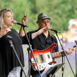 Amanda Bacon and Erik Richardson of Black Diamond Junction bring a variety of musical styles and eras to the crowd at Purple Haze Organic Lavender Farm on Friday, July 21. Sequim Gazette photo by Michael Dashiell