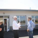 Sequim schools superintendent Gary Neal talks with Clallam County Commissioner Mark Ozias after a tour of Greywolf&rsquo;s new cross-laminated timber building on June 28. Sequim Gazette photo by Michael Dashiell
