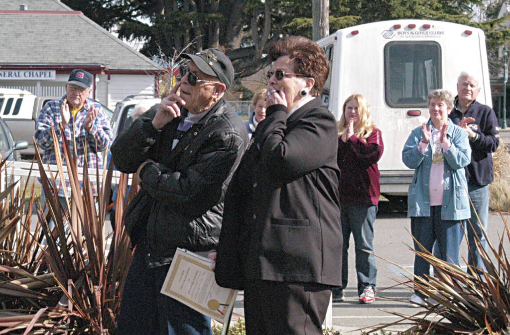 Bill and Nina Fatherson stand outside the Sequim Food Bank where they just learn that the main building was named after them in 2009. Nina served the food bank for 28 years. She died on June 24. Sequim Gazette file photo