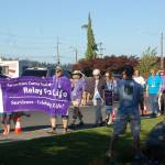 Participants in the American Cancer Society&rsquo;s Relay for Life Clallam County walked around Pioneer Memorial Park in Sequim to kick off the annual ceremony on Friday, July 28. Sequim Gazette photo by Erin Hawkins