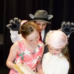 The Big Bad Wolf, played by Finn Waknitz, sneaks up on Miss Muffit played by Maria Burke, left, and Sarah Butterworth. Photo by Brandi Welch
