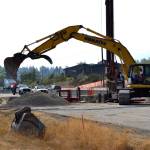 Crewmen under contract with the Department of Transportation continue work to replace a culvert with a larger one in Matriotti Creek to increase fish passage and habitat. U.S. Highway 101 will remain one lane each direction through the short stretch in Carlsborg until work is done in the fall. Sequim Gazette photos by Matthew Nash